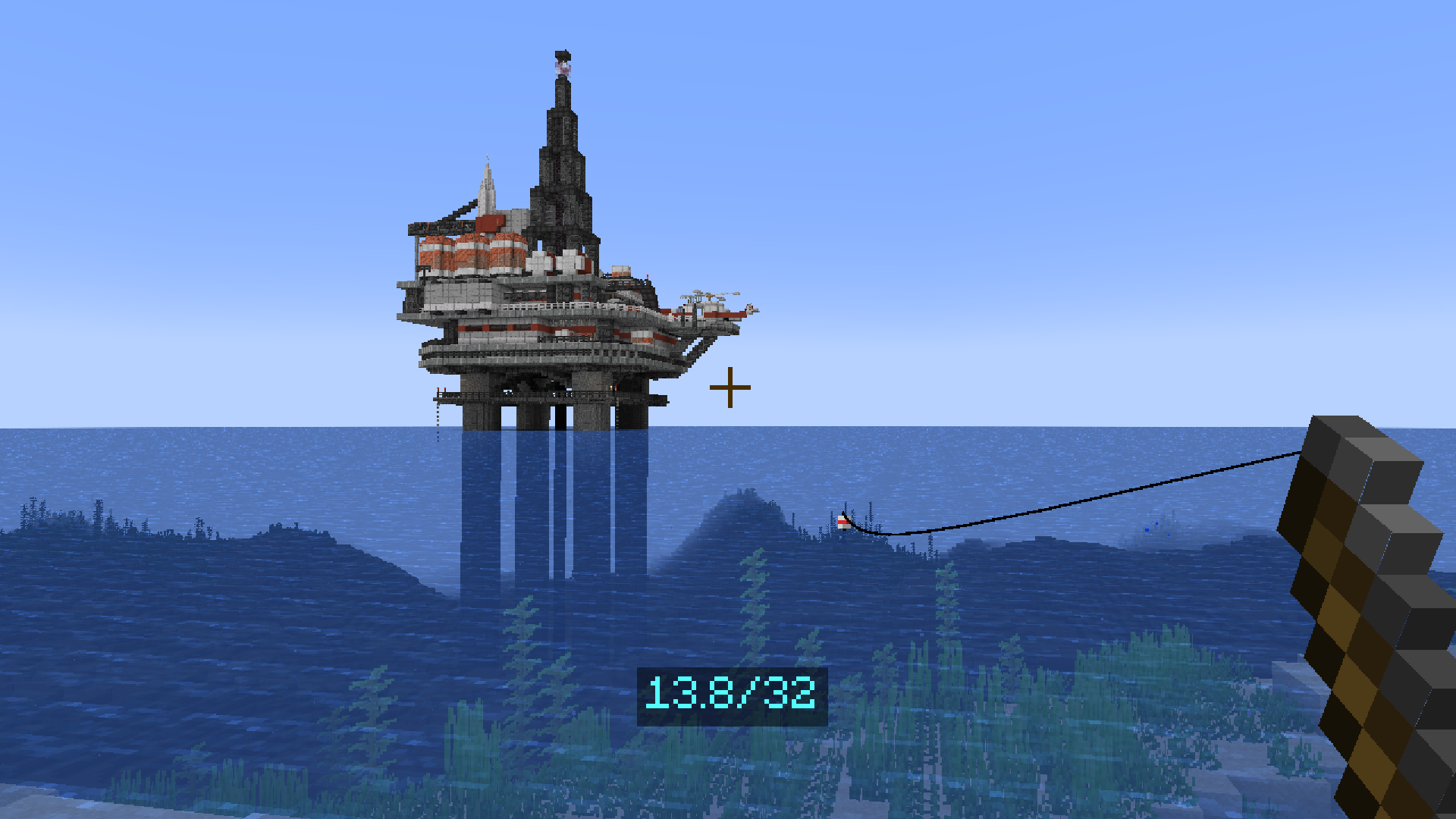 Fishing in a large body of water near an oil rig