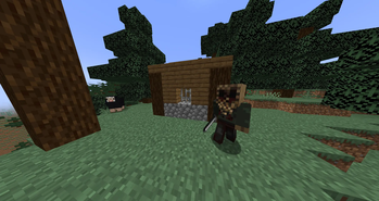some guy chills outside of his shotgun shack