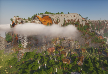 Village on a mountain covered by a cloud