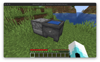 Water cauldron in front of a dispenser