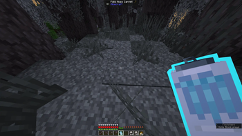 Holding a White Monster Can