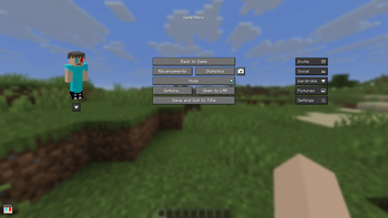 Small button in the lower left corner