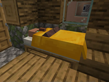 A villager sleeping in a yellow bed
