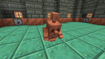 Copper Golem pressing a copper button