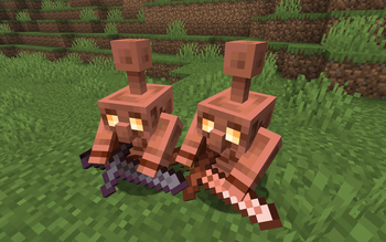 Copper golems holding netherite and copper swords