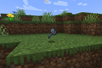 Mace on the grass
