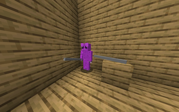 Player holding metal pipe and metal pipe on the ground