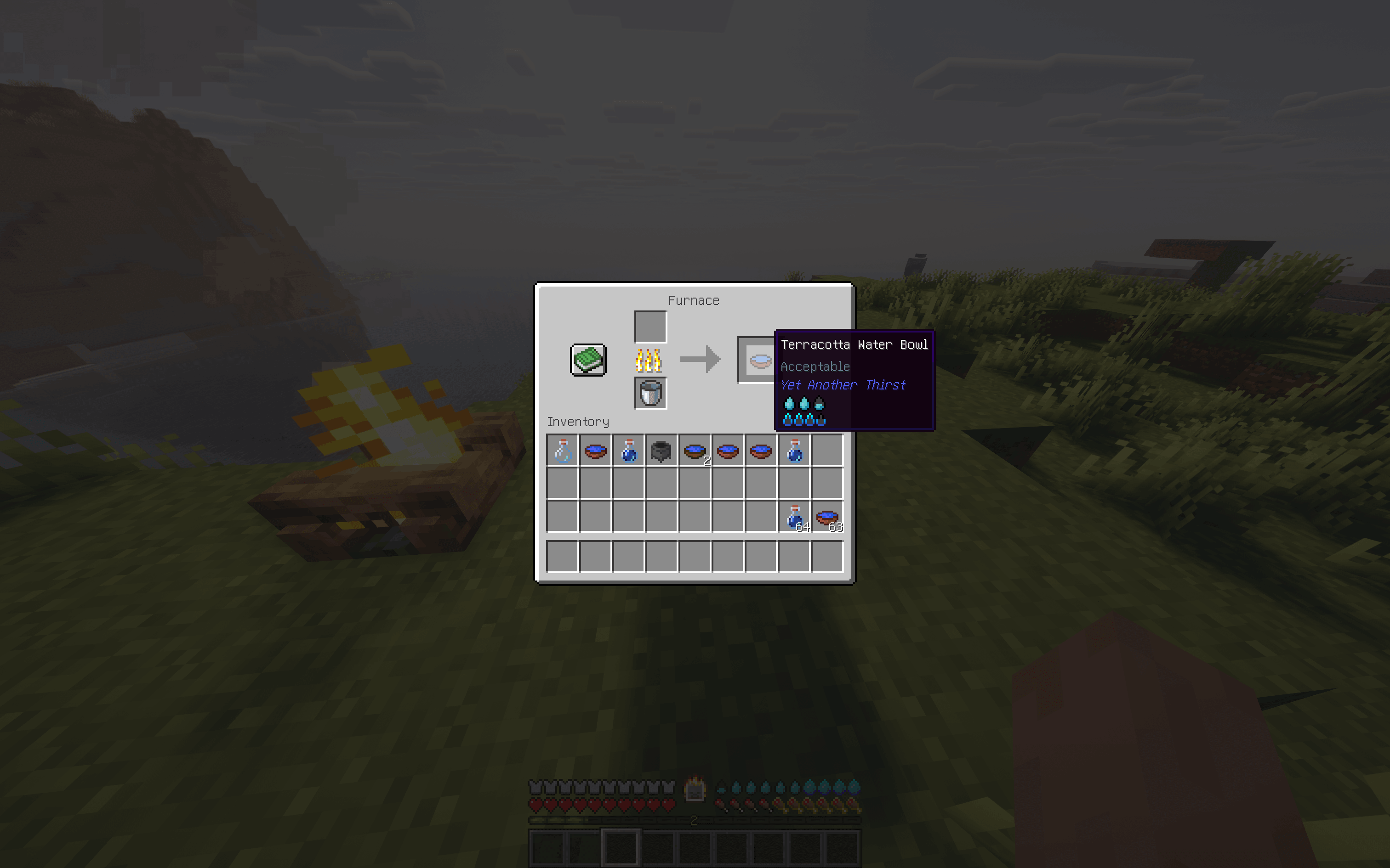 A screenshot of the Furnace UI showing the resulting Terracotta Bowl hovered in the output slot, with its item tooltip visible, after smelting is complete.