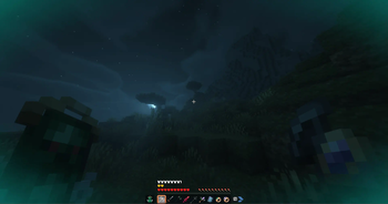 A player using The Axe of Quiet and holding a Creeping Totem in their offhand.

