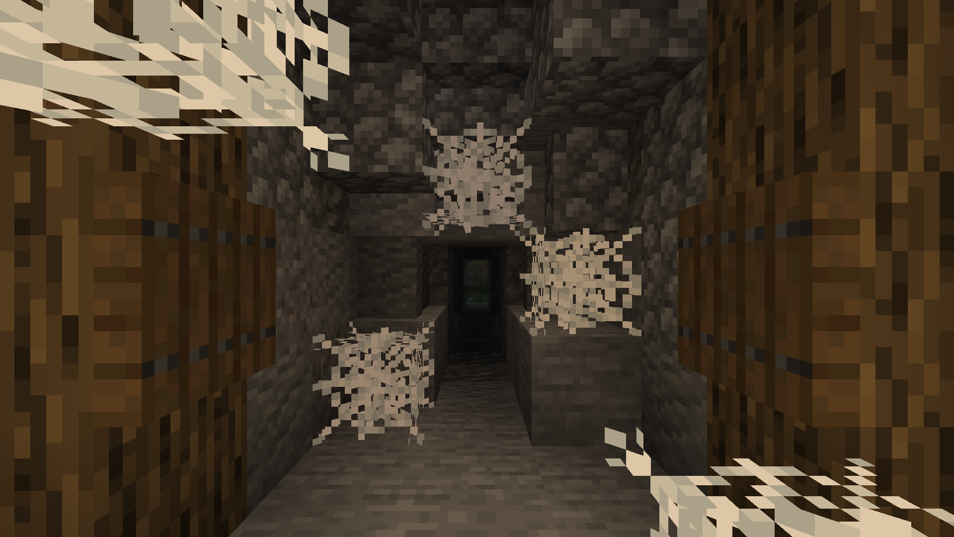 Showcase of Blocky Cobweb scattered around a cave passage