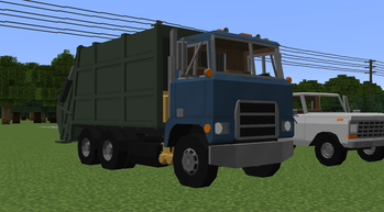 Mack F-700 Garbage Truck