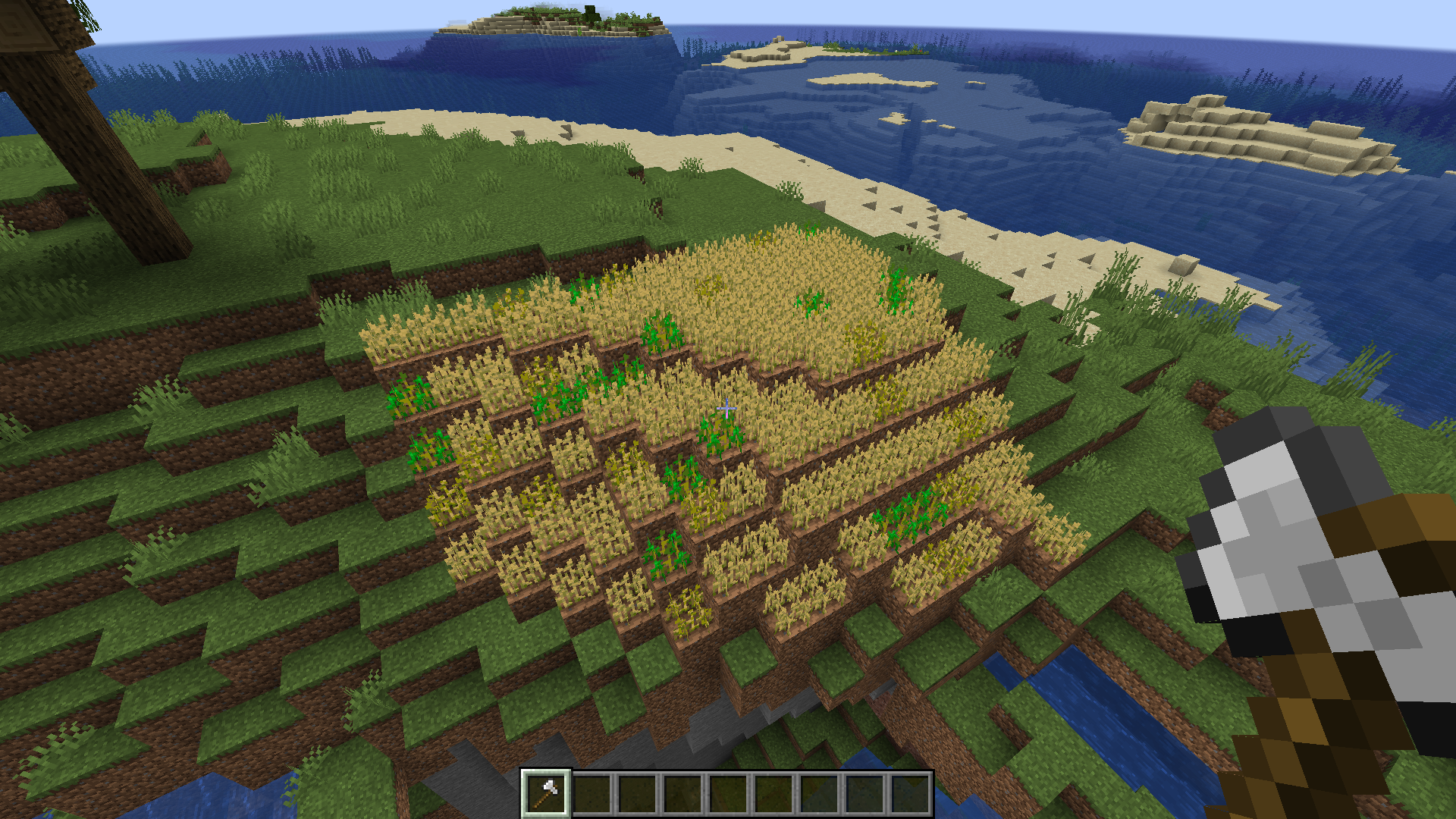 A farm created with WorldShaper. The commands here used are
1. /replace grass_block farmland
2. /replace >farmland 70%wheat[age=7],wheat[age=6],wheat[age=5]