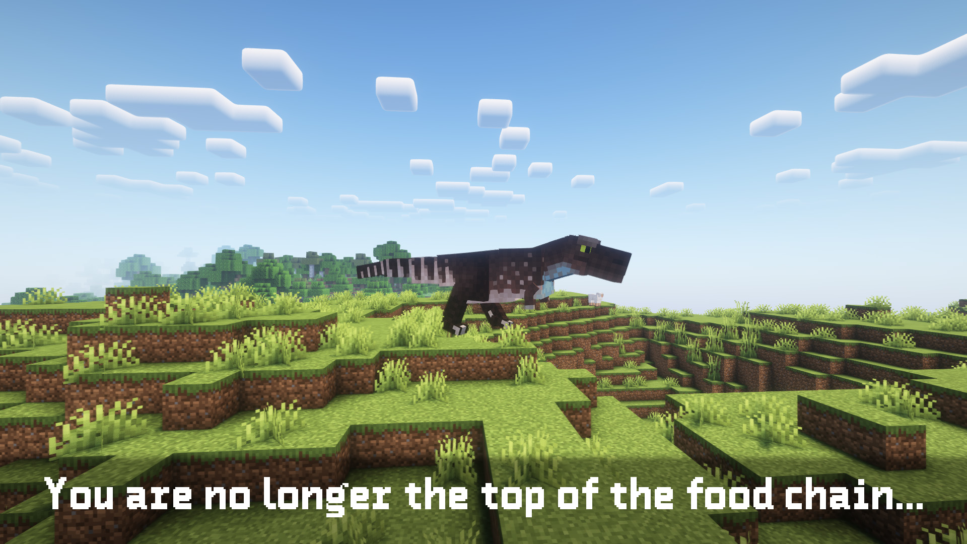 A t-rex lurks on a ridge, with the text "You are no longer the top of the food chain..." superimposed over the image.
