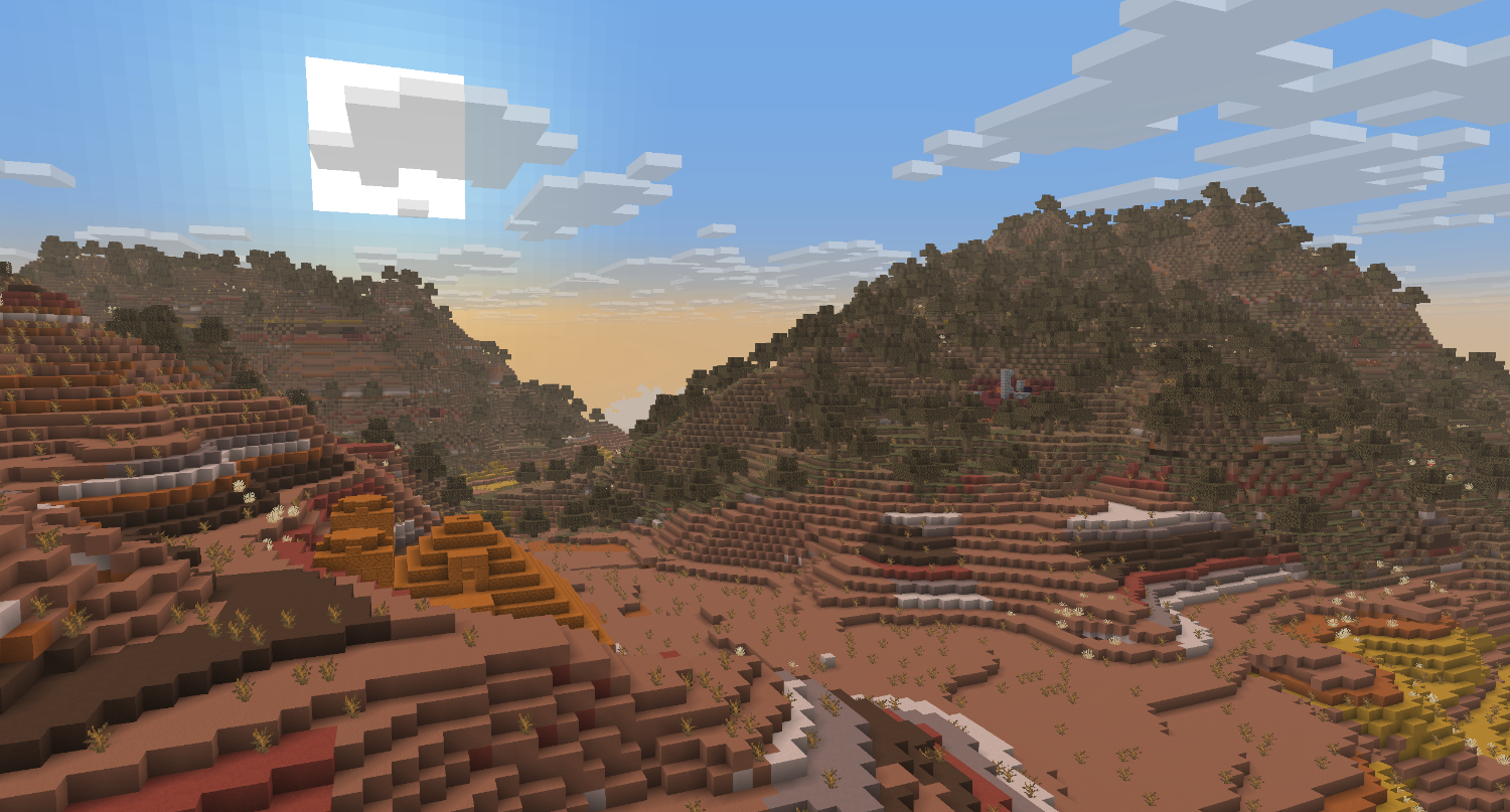 A sunrise overlooking a badlands pyramid