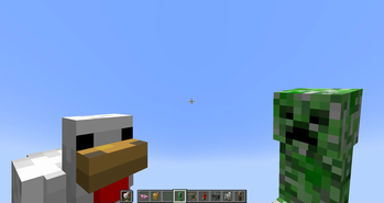 Chicken & Creeper Spawn Eggs In Player Hand