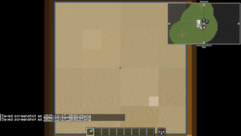 the sand with a spyglass