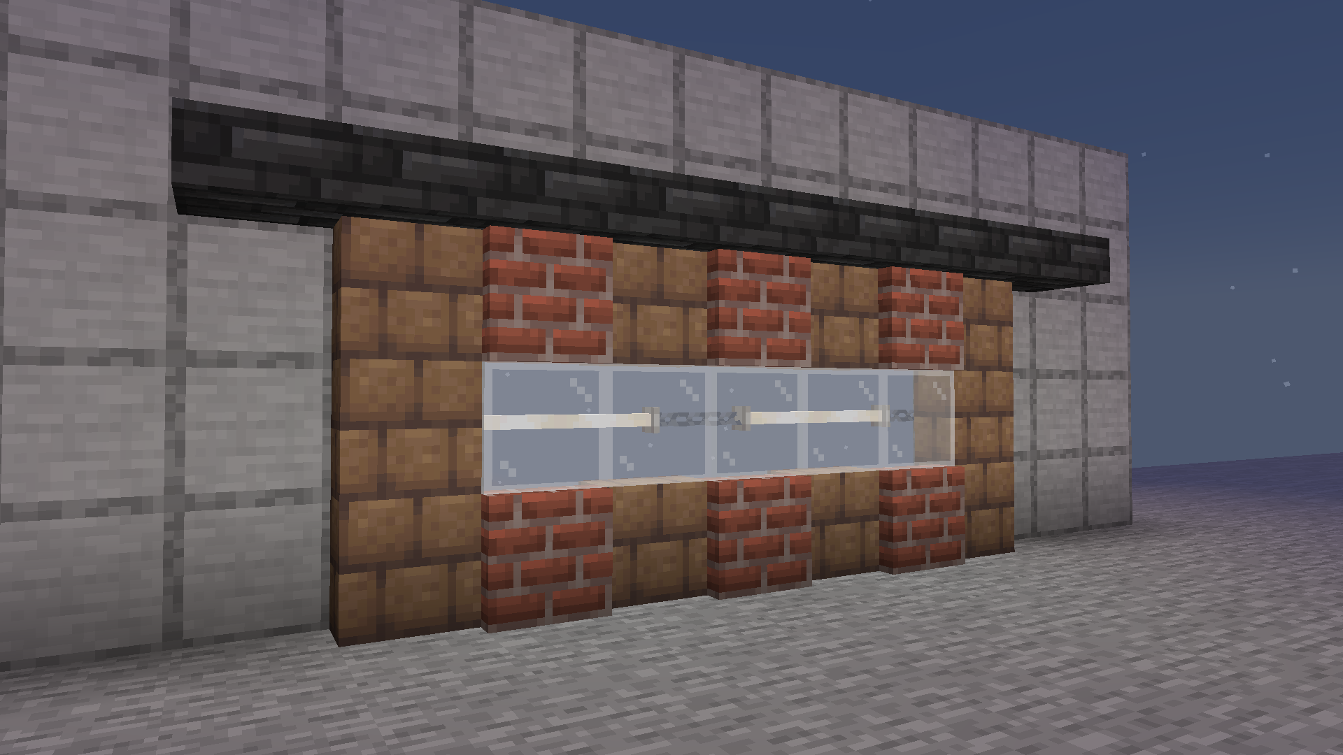 Wall built from vertical slabs and wall blocks