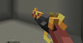 Gold gun in hands