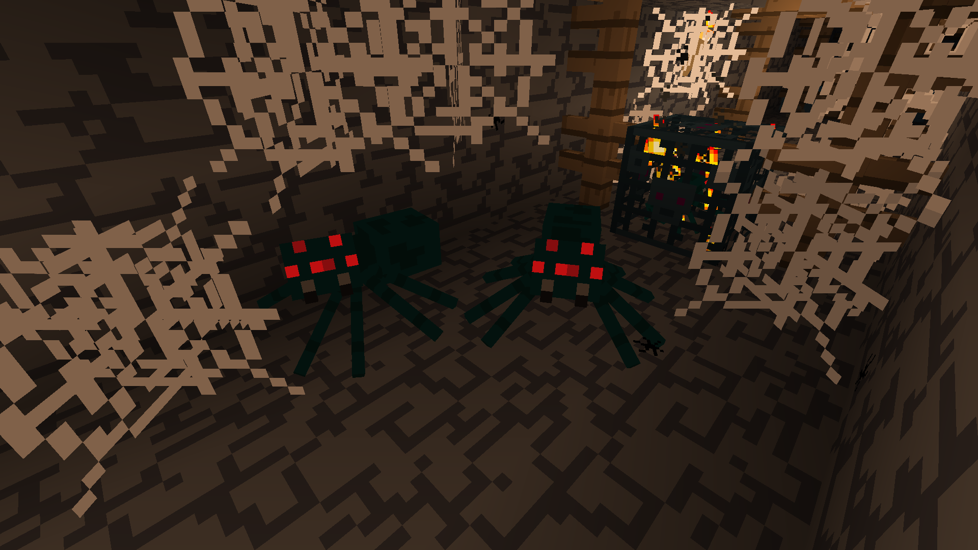 Two cave spiders by a spawner in a mineshaft