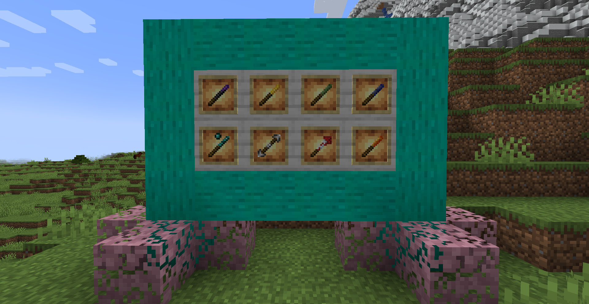 Wall of Wildersung logs and planks with 8 item frames holding different magic wands