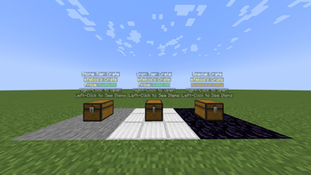 A small showcase of crates, three of them standing next to each other.