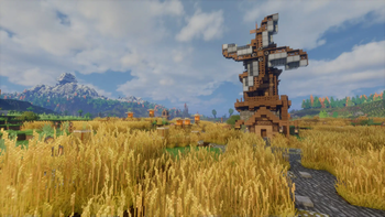 Windmill surrounded by lonely mountain