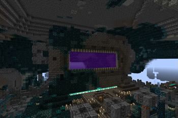 Here you can see the Nether Portal ignited in the Ancient City portal frame