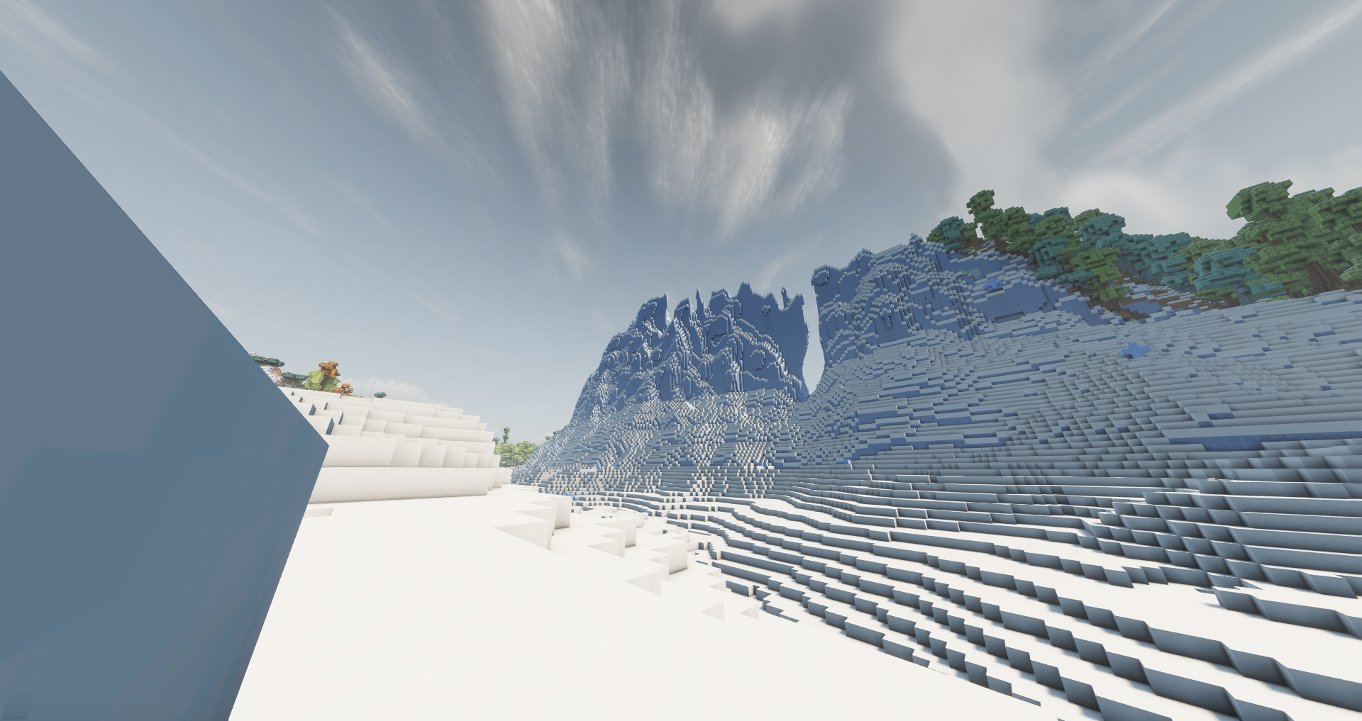 A fantasy styled ice mountain, thin and blocking the terrain like an enormous wall.