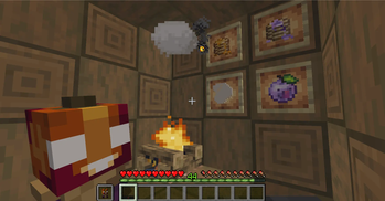 pan and pancakes with new food totem and apple with dough