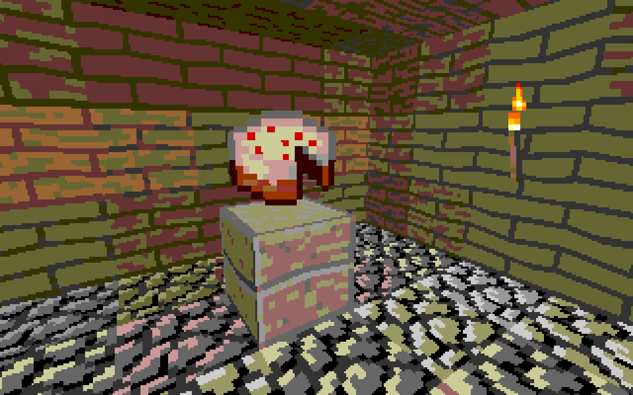 A cake with a slice missing on a table in a brick dungeon
