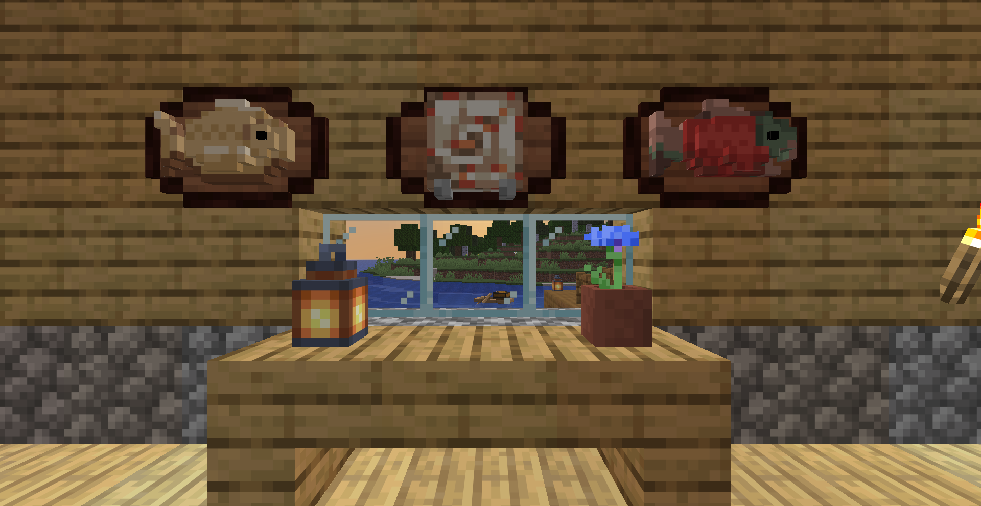 From left to right, cod, nautilus shell and salmon on wall the mounts that the mod adds.