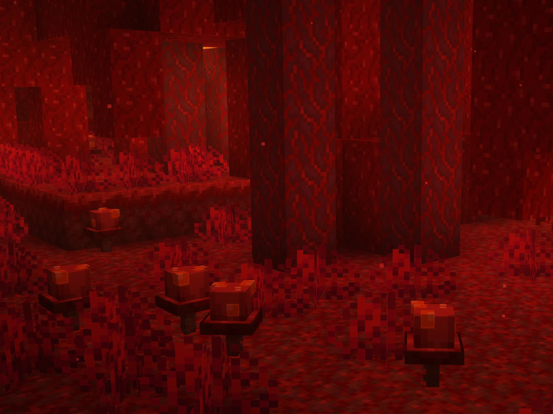 A screenshot of the game Minecraft. Taken within the Nether dimension, in a Crimson Forest biome. Dotted about the scene are five crimson mushrooms.