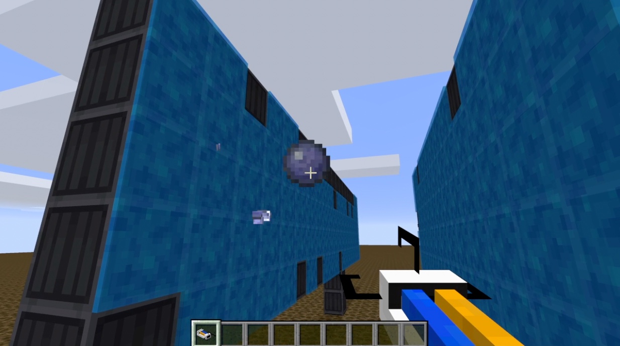 A screenshot of the mod showing the paint gun painting the wall with the repulsion gel ball.