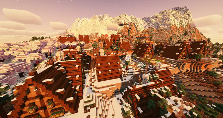 snowy village with huge mountains