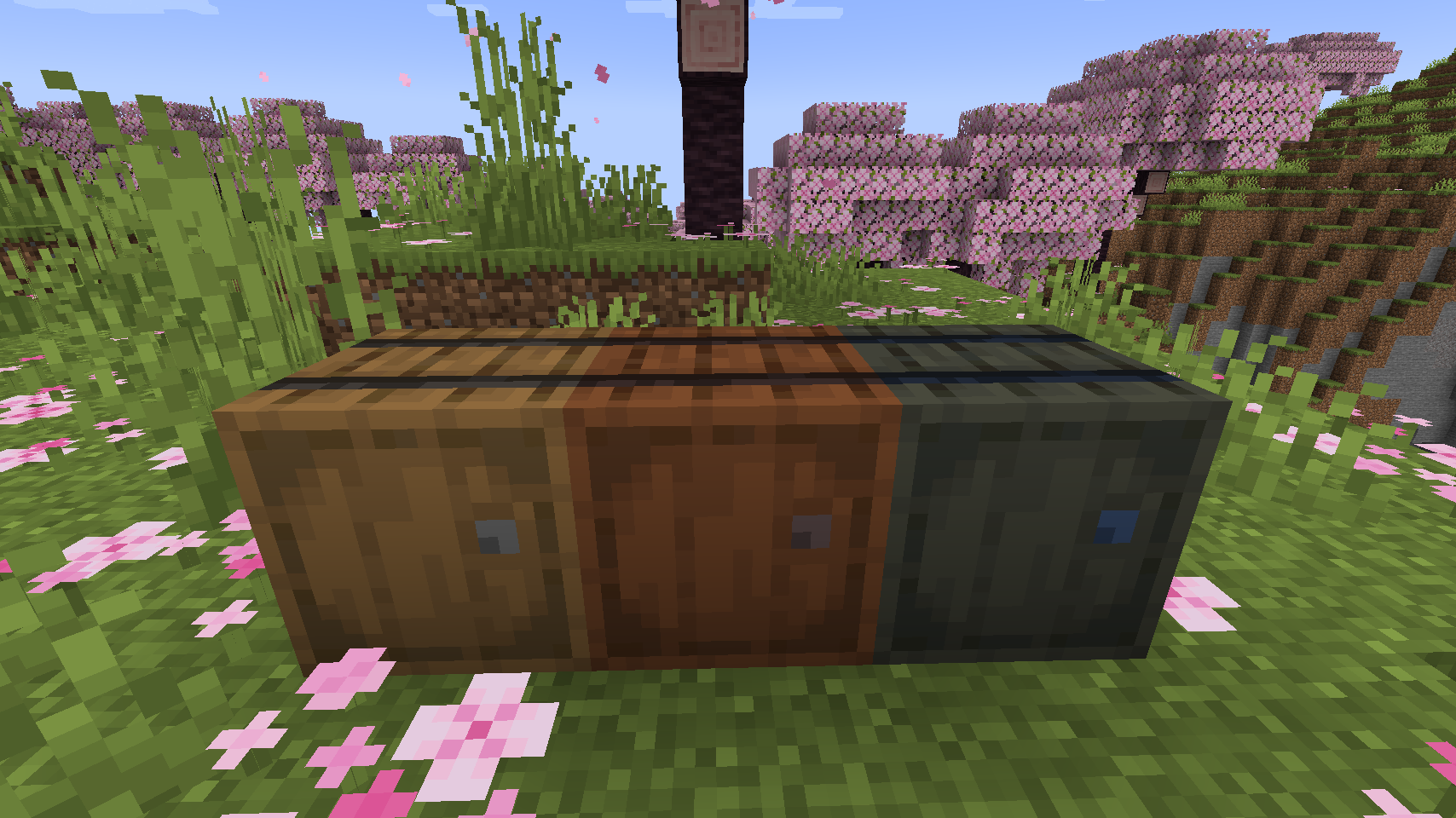 All three barrels on the ground next to each other.