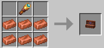 Recipe of a camera, 6 copper ingots at the bottom as if you were making a trapdoor, then spyglass on the top row at the center, slots on the right and the left to spyglass are empty