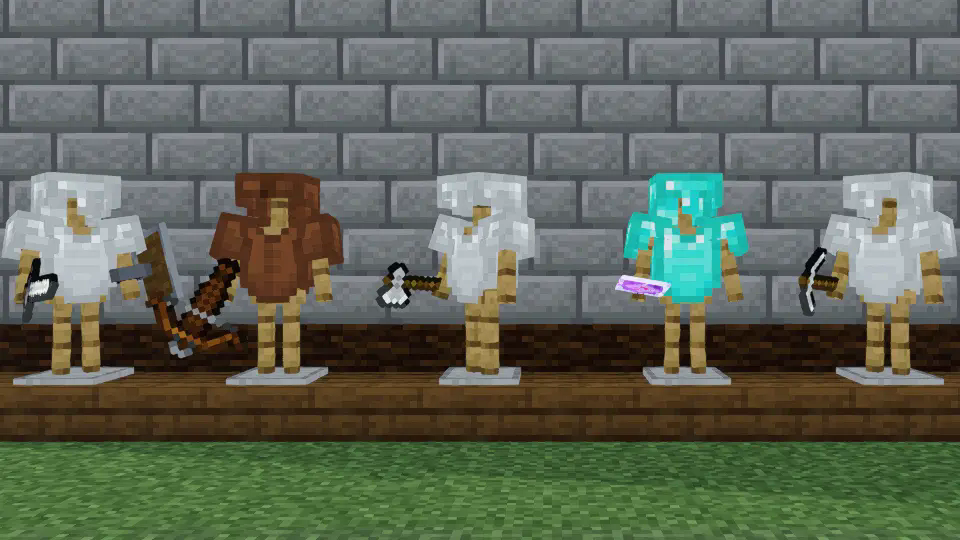 minecraft screenshot showing five armor stands with different equipment pieces on