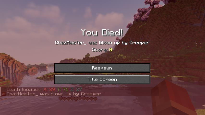 Image showing Minecraft death screen with an extra line showing in the chat displaying the player's death coordinates