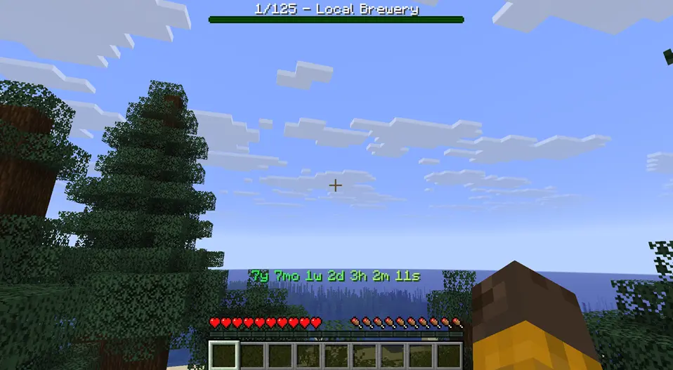 A Minecraft World is being displayed, there is a green Bossbar at the top of the screen, which is showing the current Achievement to be achieved and the count. Over the Hotbar is a green timer, which is showing the time in years, months, weeks, days, hours, minutes and seconds..