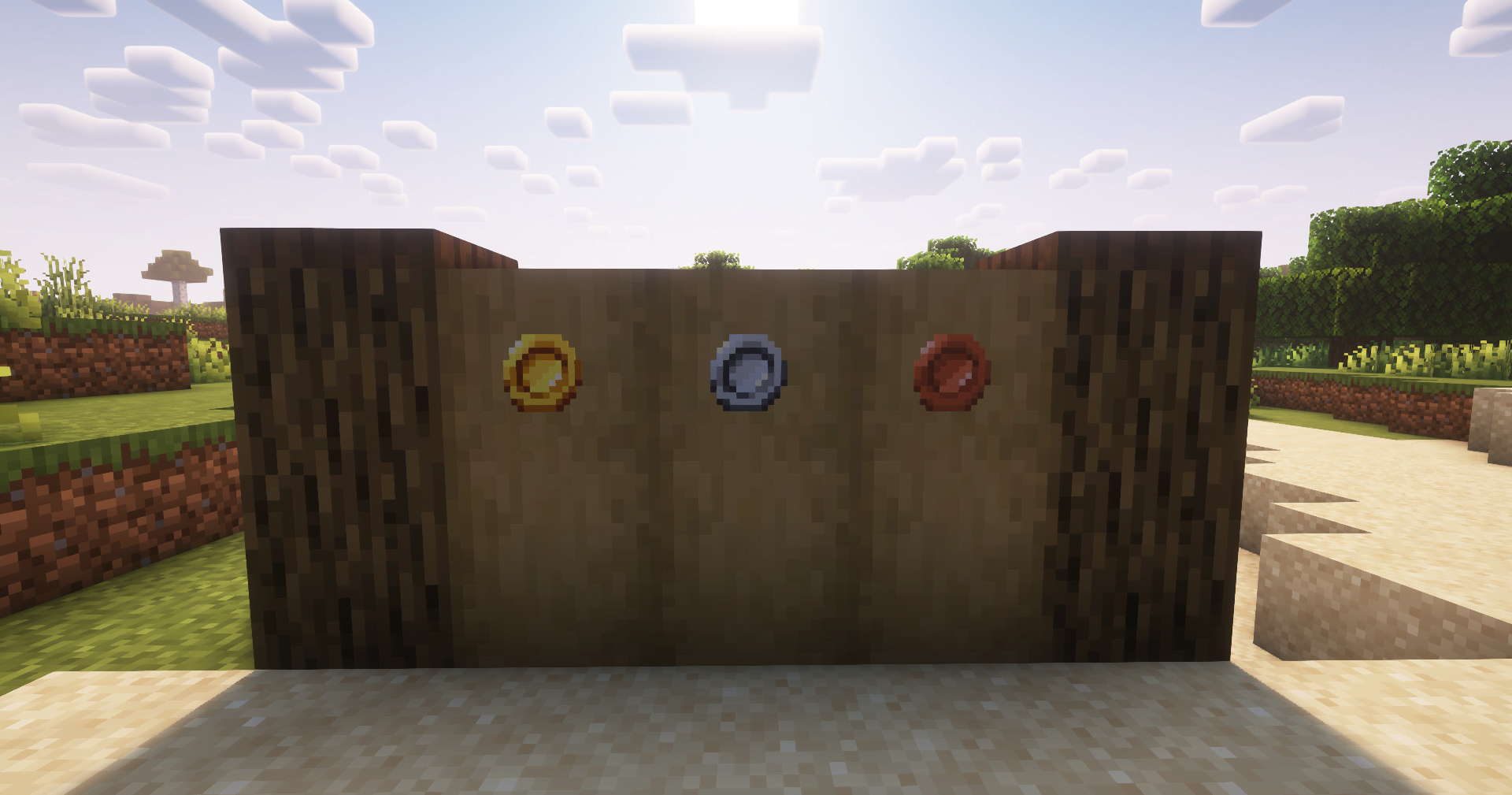 The three coins added by the mod