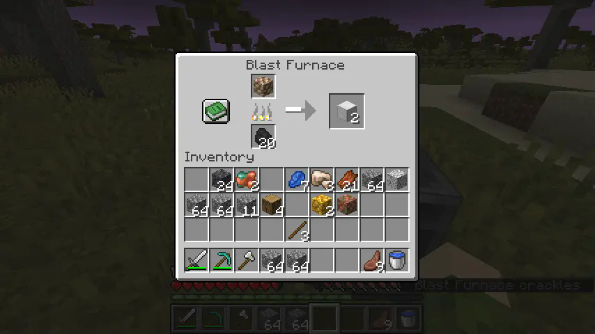 The GUI of a Blast Furnace, containing 20 coal in the fuel slot, one block of raw iron in the input slot, and two blocks of iron in the output slot. The Arrow showing the smelting progress indicates approximately 50% Progress, the flames that indicate the fuel level indicate, that approximately 25% of the previously used fuel source is left over. The Player Inventory cointains two Raw Gold Blocks and one Raw Copper Block, along some tools, blocks and food.