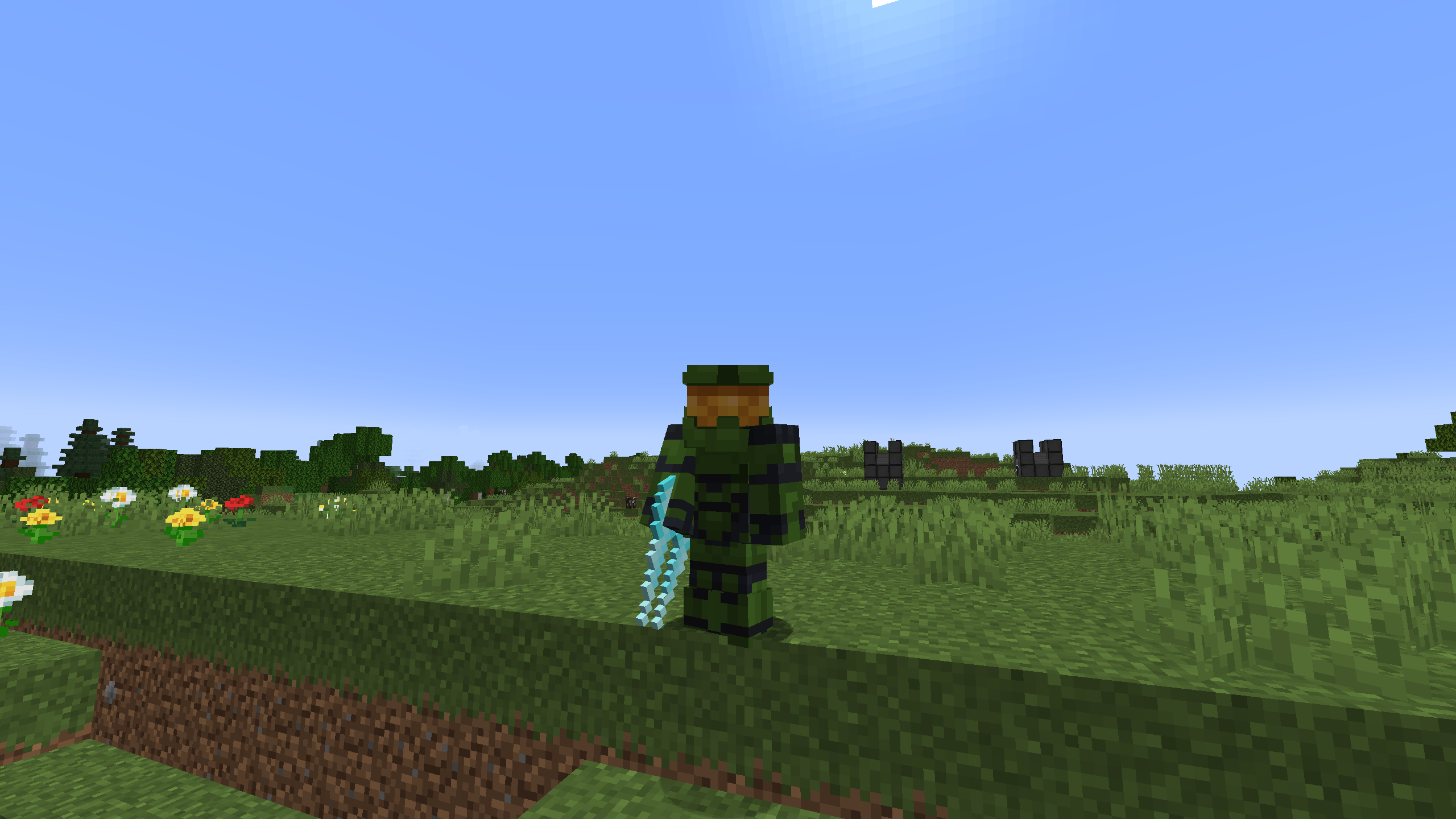 A player holding an energy sword and wearing green Mk. V armor