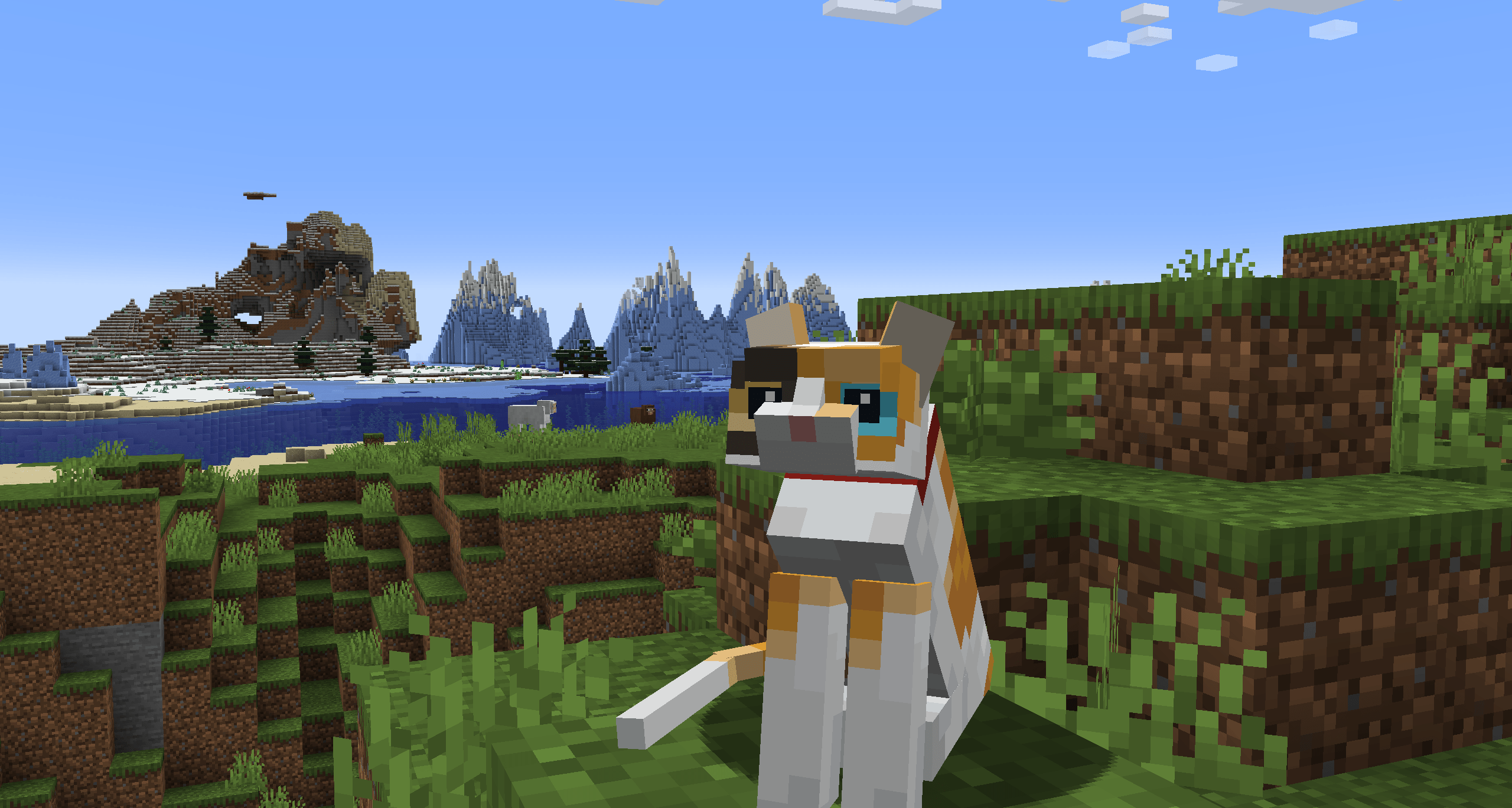 A calico cat sitting in a plains biome with the Refined Cats texture