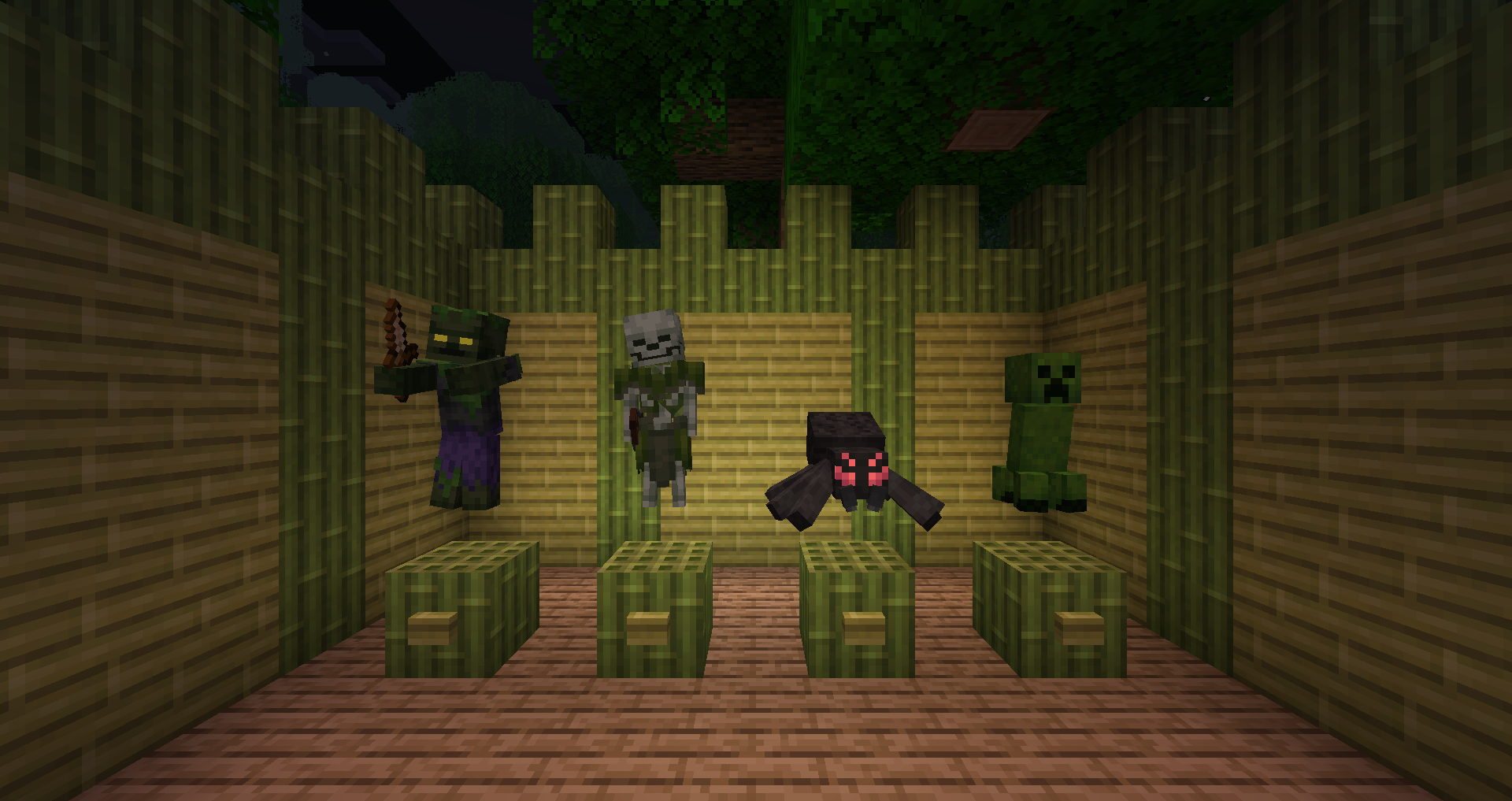 A zombie, skeleton, spider and creeper being displayed ontop of a bamboo block