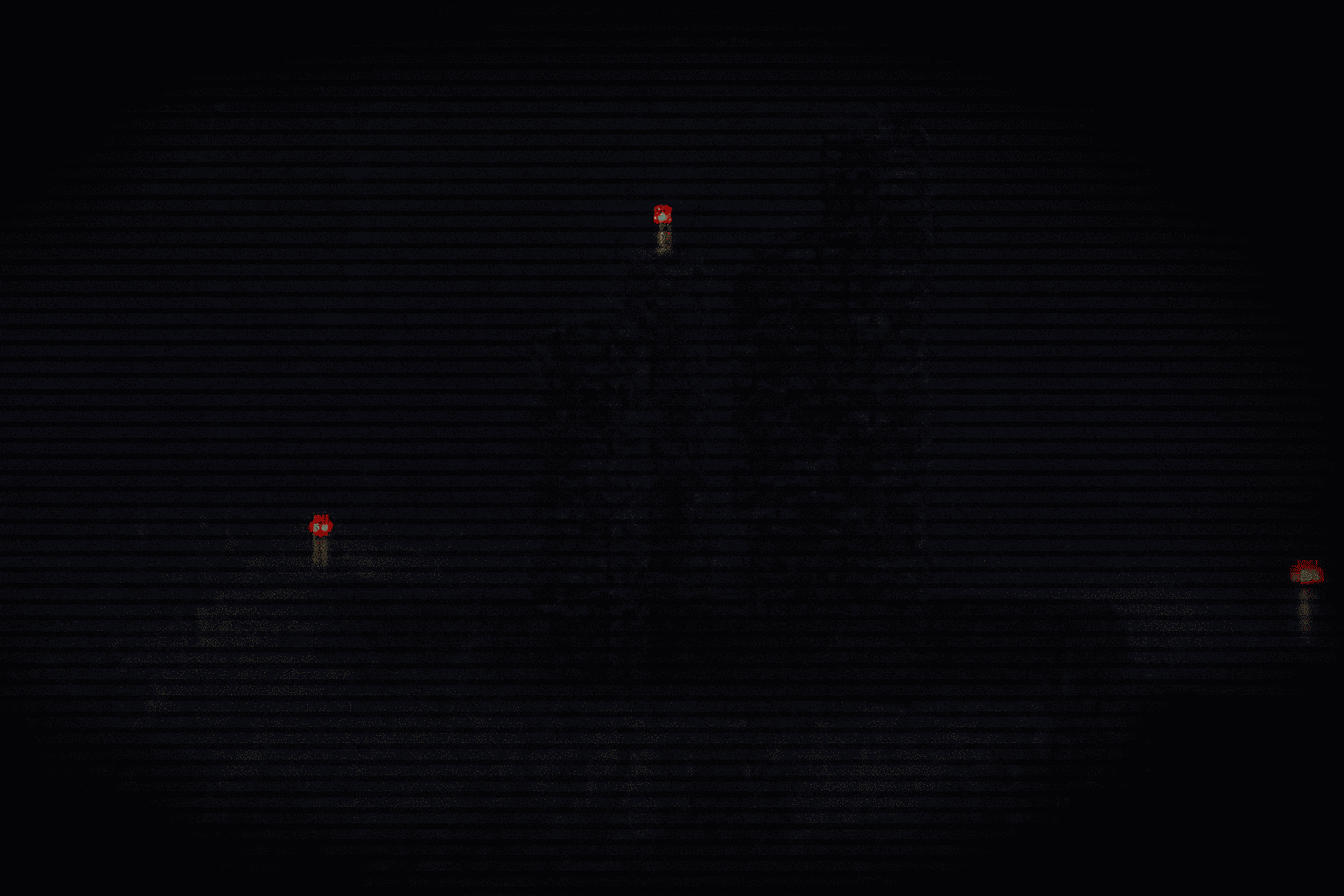 Bedrock pillars with redstone torches in a dark atmosphere