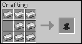 Crafting table with iron ingots in ever slot except the middle left.