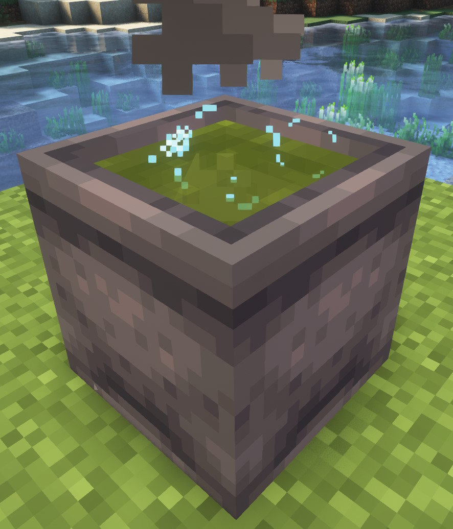 A bubbling cauldron filled with a green liquid.