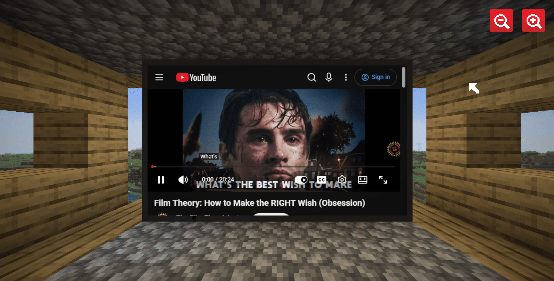 The image shows the minecraft player in the keyboard focus mode watching a video