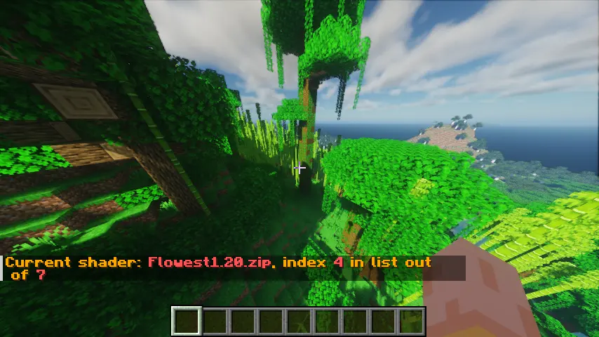 A minecraft world with shaders applied with the text 'Current shader: Flowest1.20.zip, index 4 in list out of 7' in chat