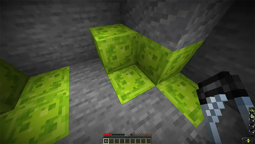 Holding a vial infront of Alien Goo